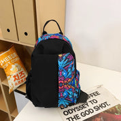 Sam | Umhängetasche mit Graffiti-Design und Diebstahlschutz