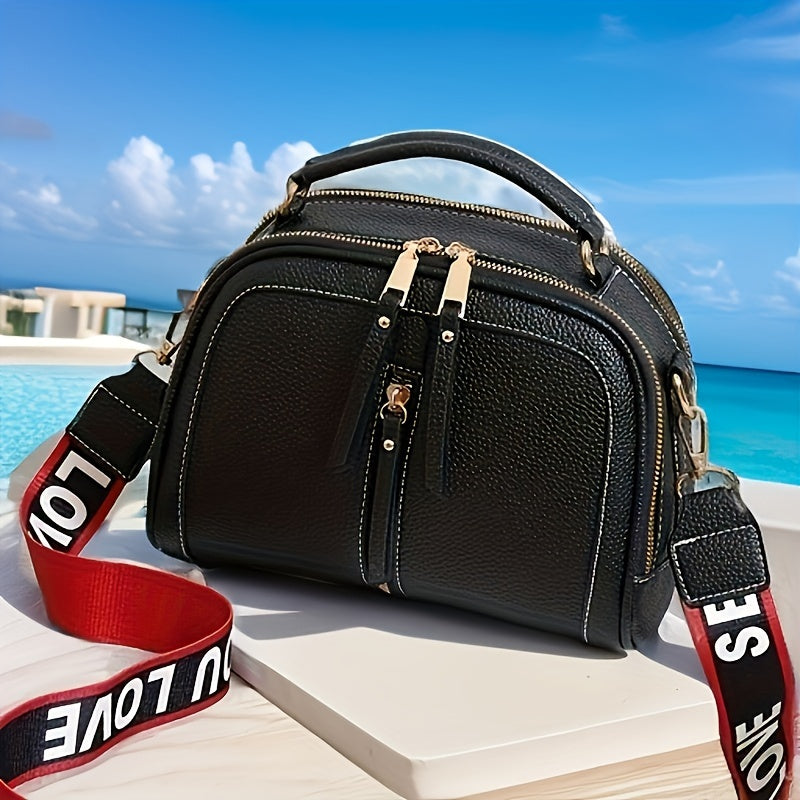 Eva | Kompakte Schultertasche mit Kontrastdetails