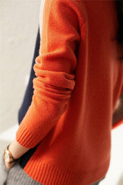 Aquisha | Damenpullover mit Retro-Streifen in Marine und Orange
