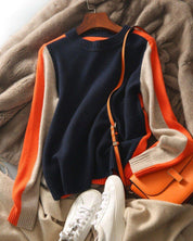 Aquisha | Damenpullover mit Retro-Streifen in Marine und Orange